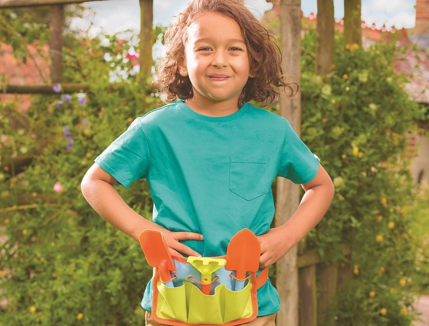 Young Boy Child Using Nutley's Children Kids Seat Storage Tool Bag